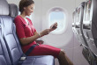 American Airlines - Jeune femme à bord